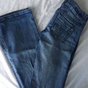 Super low rise Guess Jeans.